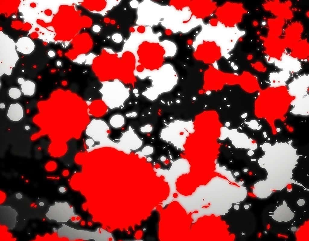 紅黑白色爆裂色彩對比 壁紙 — 鮮豔的紅色、白色和黑色油漆飛濺創造出混亂而充滿活力的抽象構圖。
