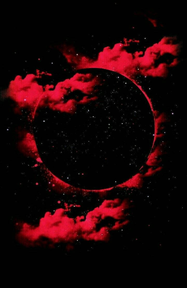 紅色星雲雲彩圍繞著一個帶有星星的黑色宇宙日食。