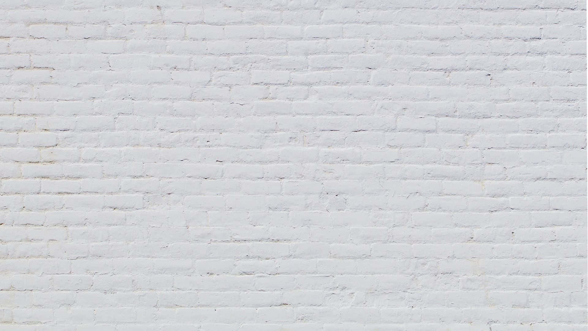 白色磚牆，帶有可見的砂漿線和細微紋理。