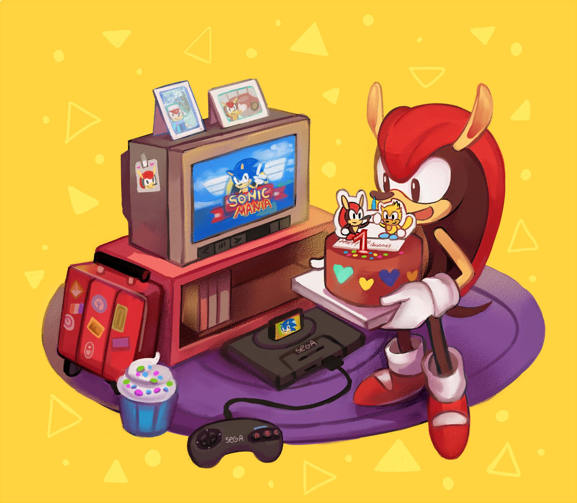 Mighty The Armadillo 桌布 壁紙 — 納克魯斯在復古世嘉主機和顯示《Sonic Mania》的電視旁，用蛋糕和杯子蛋糕慶祝。