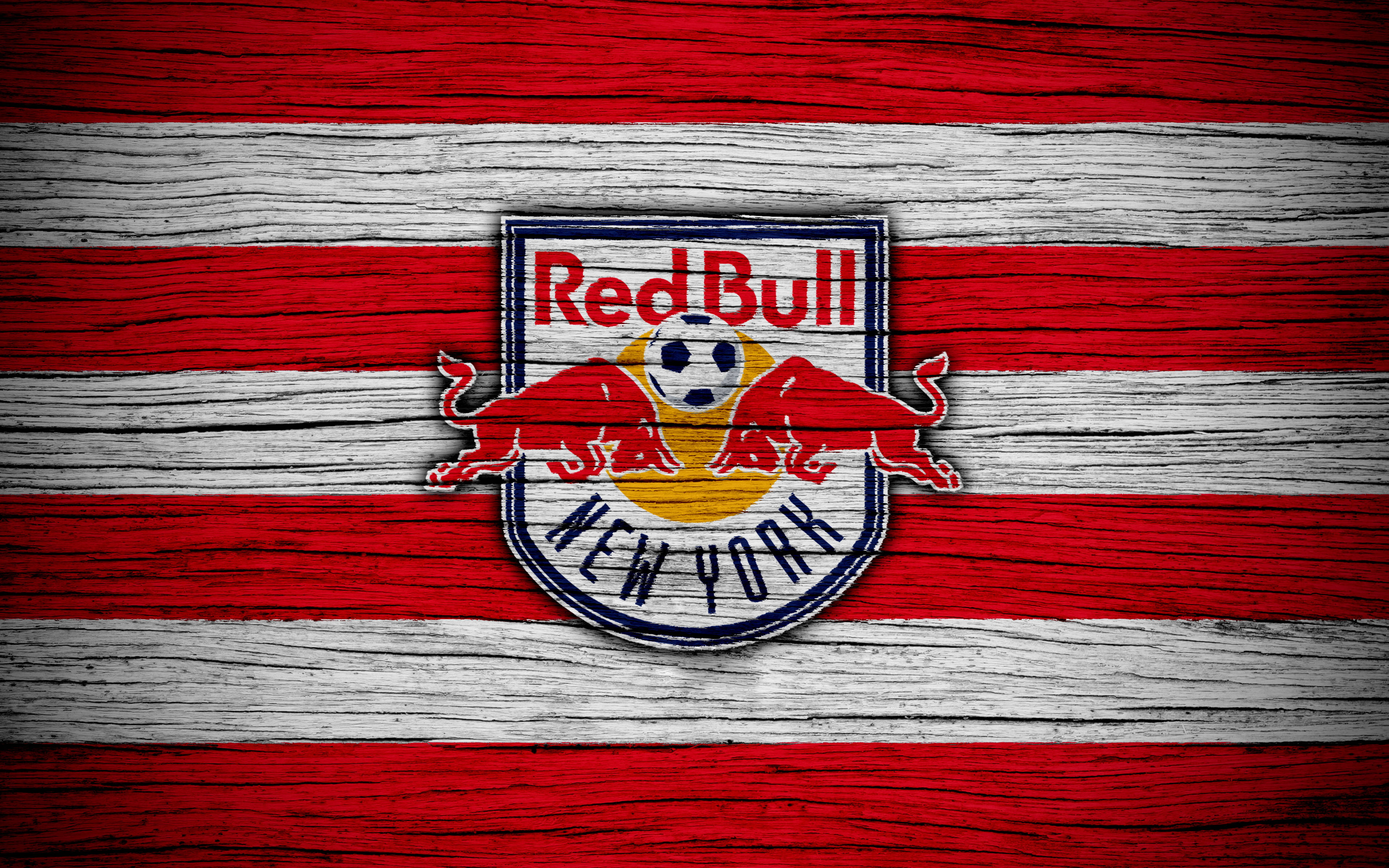 紐約紅牛 壁紙 — Red Bull New York 足球隊標誌縫在紅白條紋木板上。
