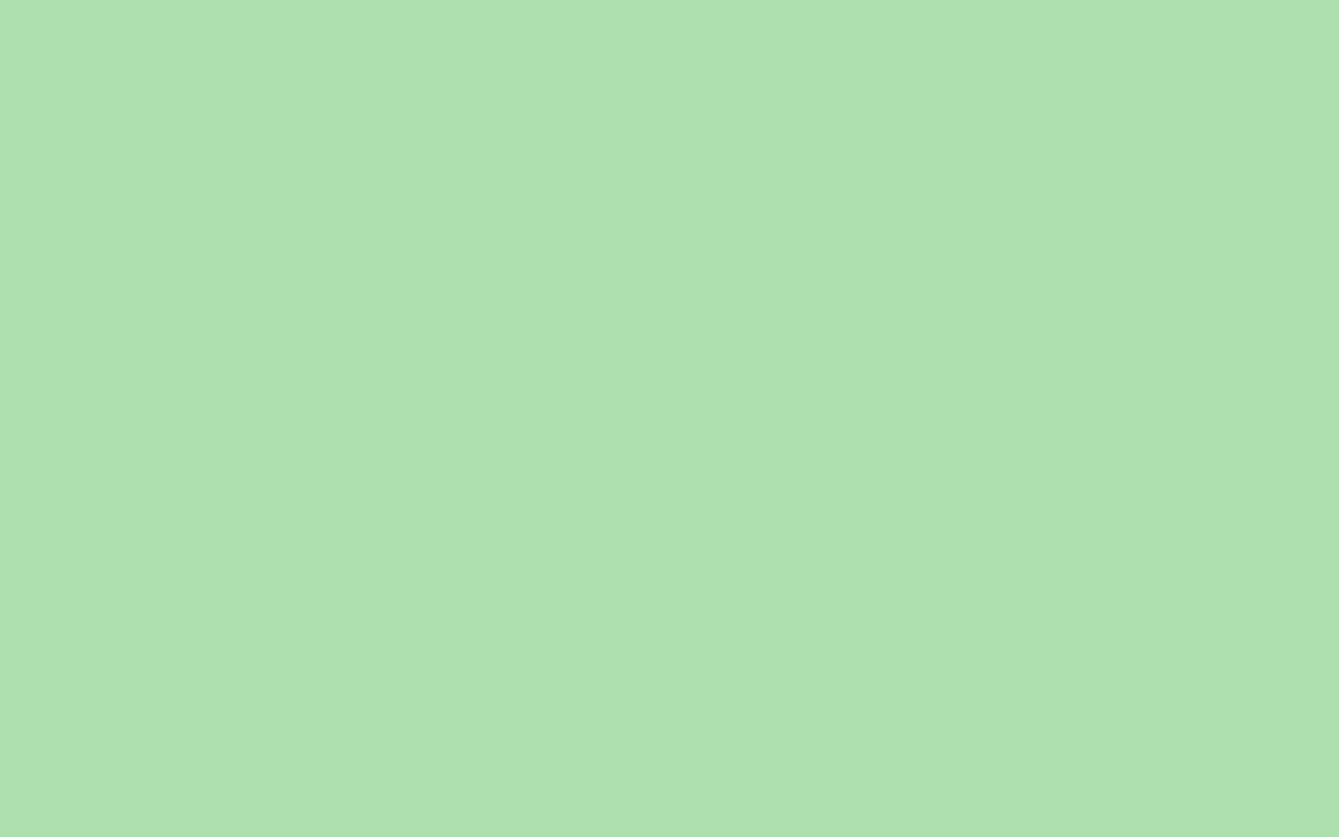 Green Solid Color 桌布 壁紙 — 純淡綠色背景，沒有可見的物體或細節。