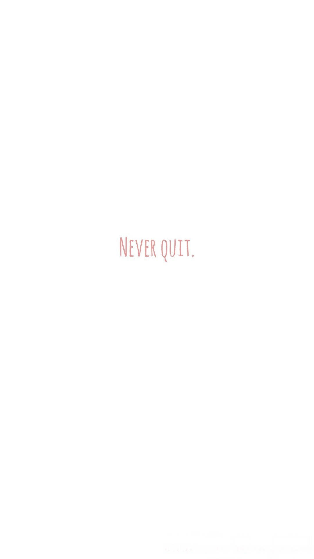 白色背景上的粉紅色勵志文字 never quit