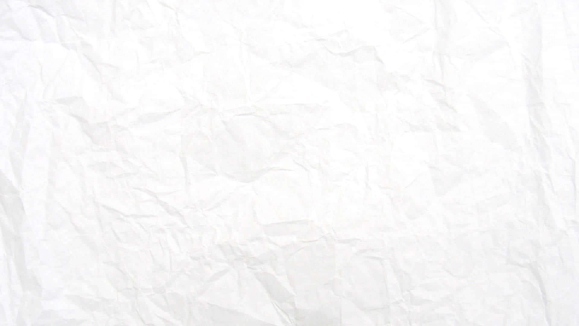 純白實心背景圖像 壁紙 — 皺巴巴白紙的特寫，柔和陰影突出其紋理摺痕。