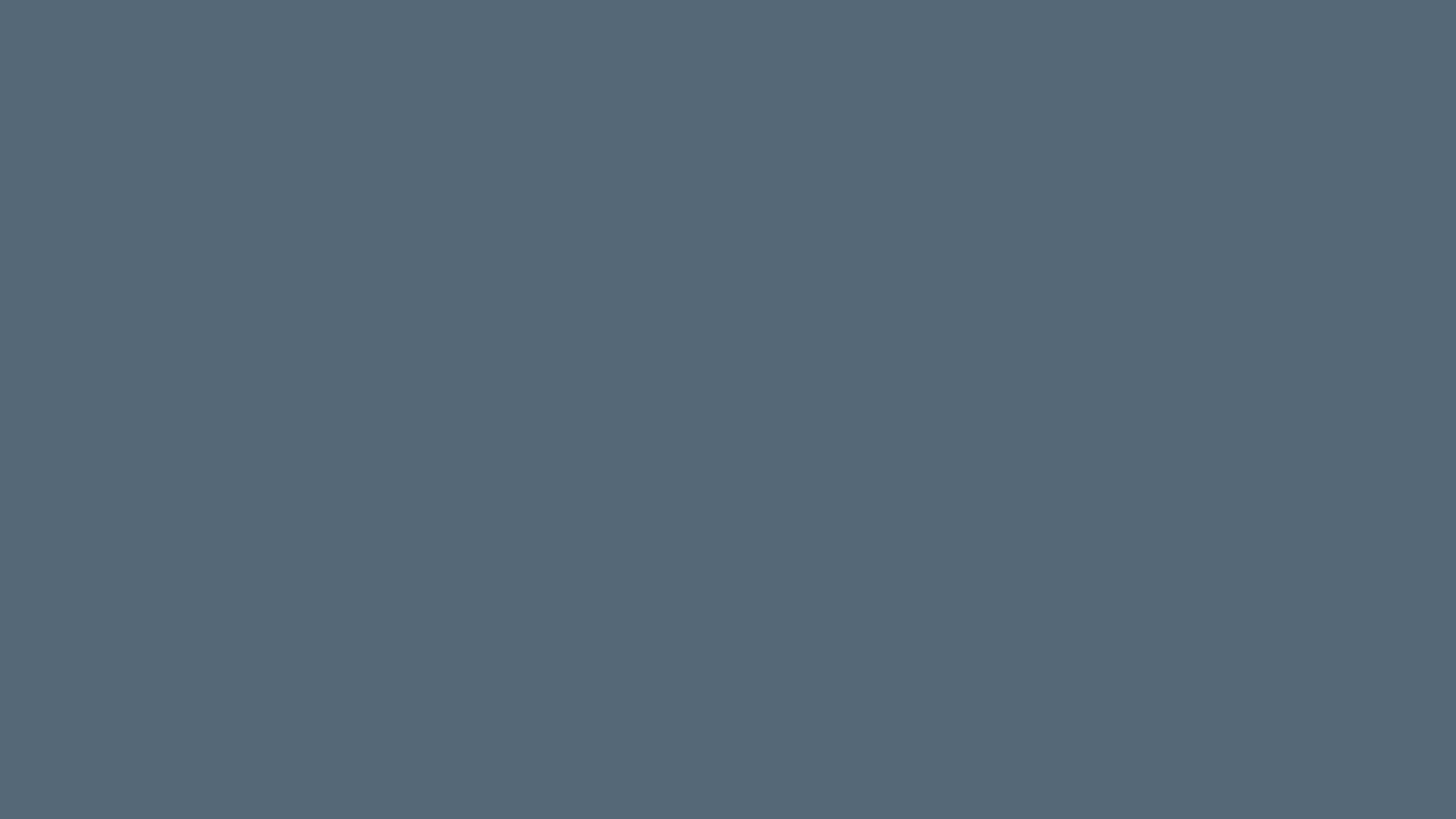 Solid Grey 桌布 壁紙 — 純色石板灰背景，帶有細微紋理，整個畫面色調均勻。