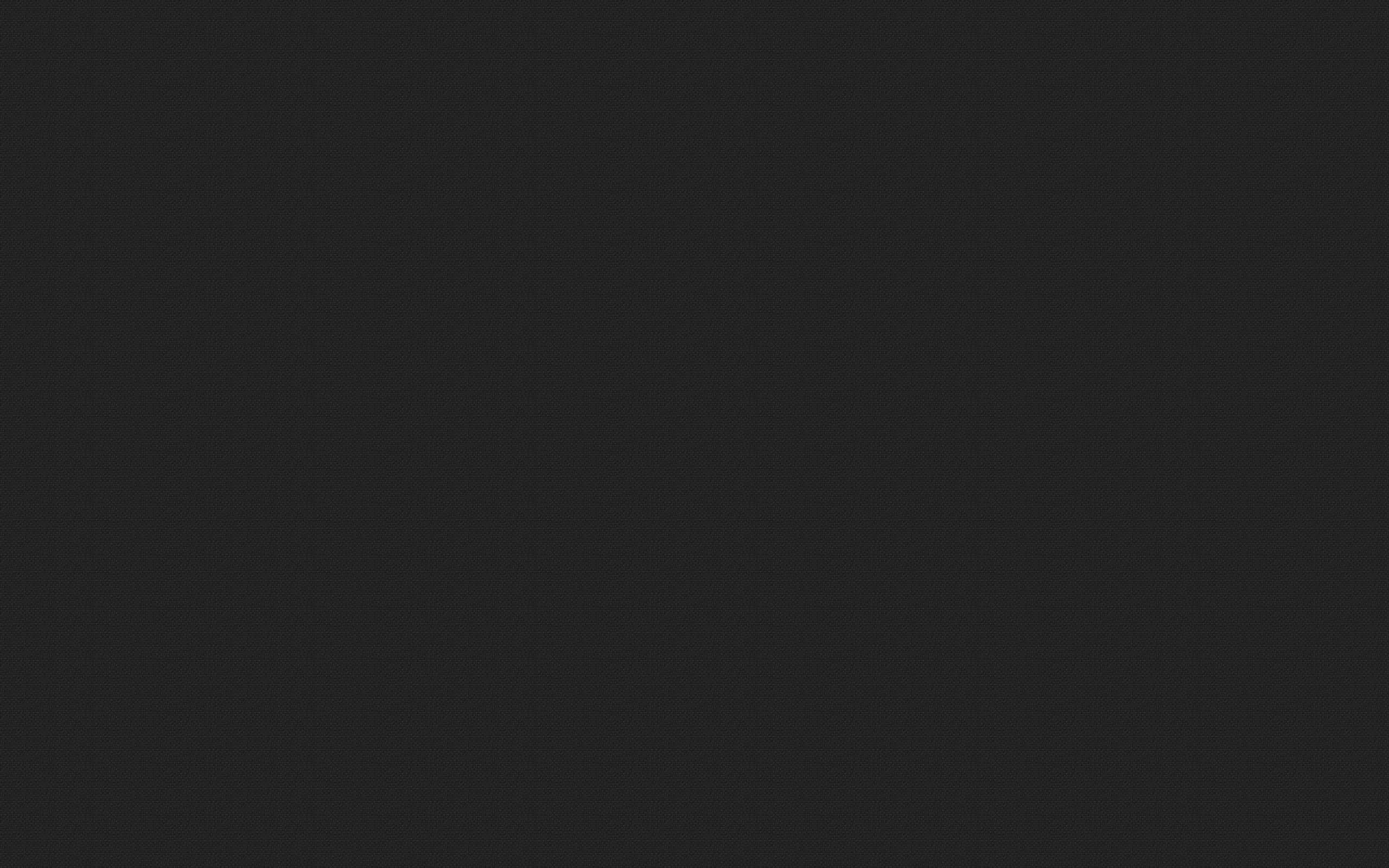 純黑背景 壁紙 — 純色深灰色紋理背景，帶有細微顆粒和均勻色調。