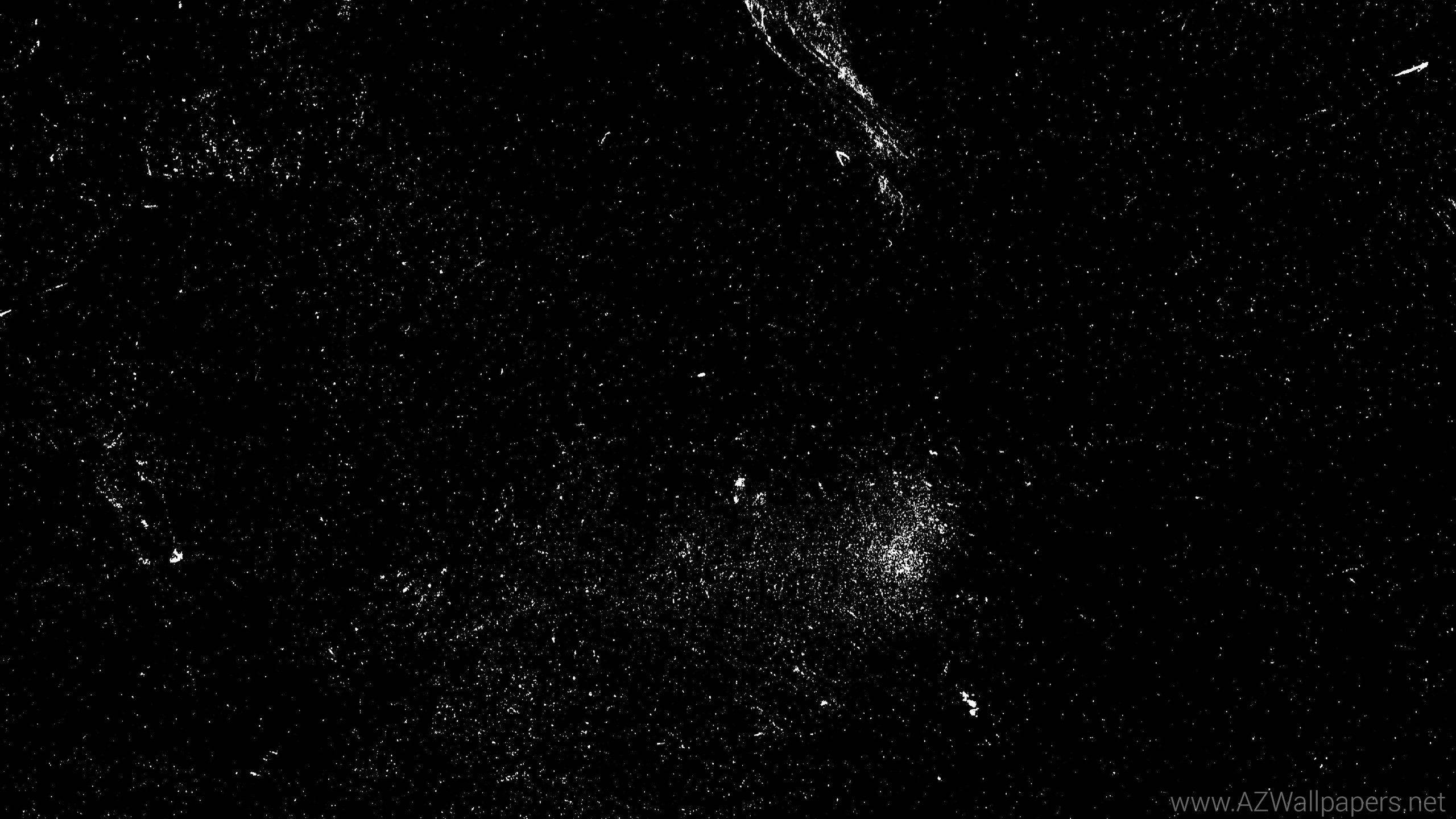 星星 桌布 壁紙 — 純黑背景上散佈著白色斑點和條紋，宛如宇宙塵埃或數位噪點。
