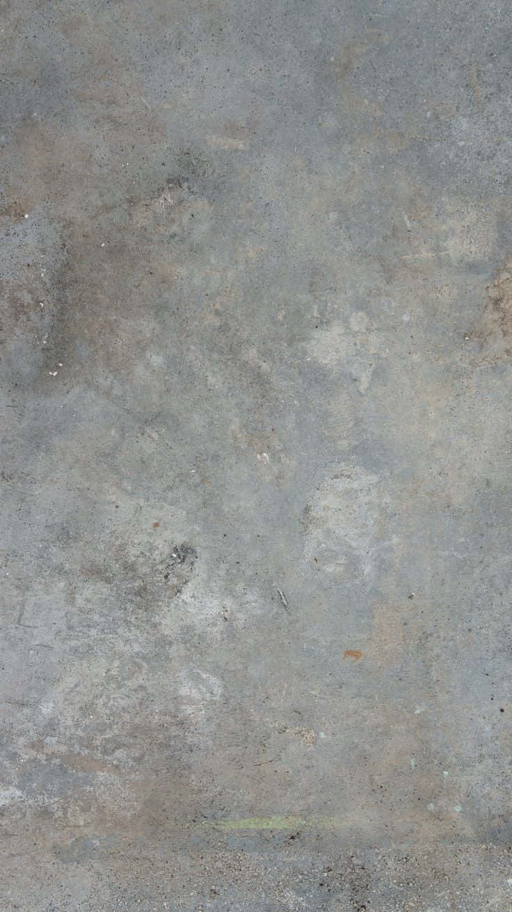 素灰混凝土紋理圖 壁紙 — 風化灰色混凝土的特寫，帶有細微污漬和紋理變化。