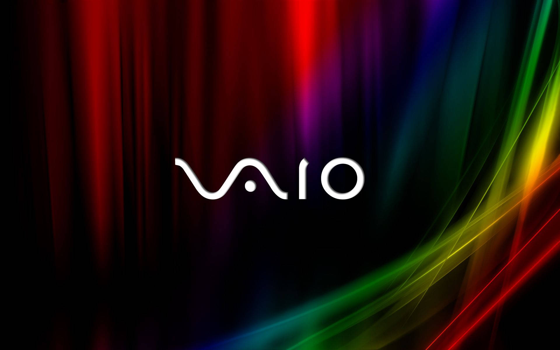 索尼光線流動 壁紙 — VAIO 標誌在動態彩虹漸變背景上發出白色光芒，並帶有流動的光線條紋。