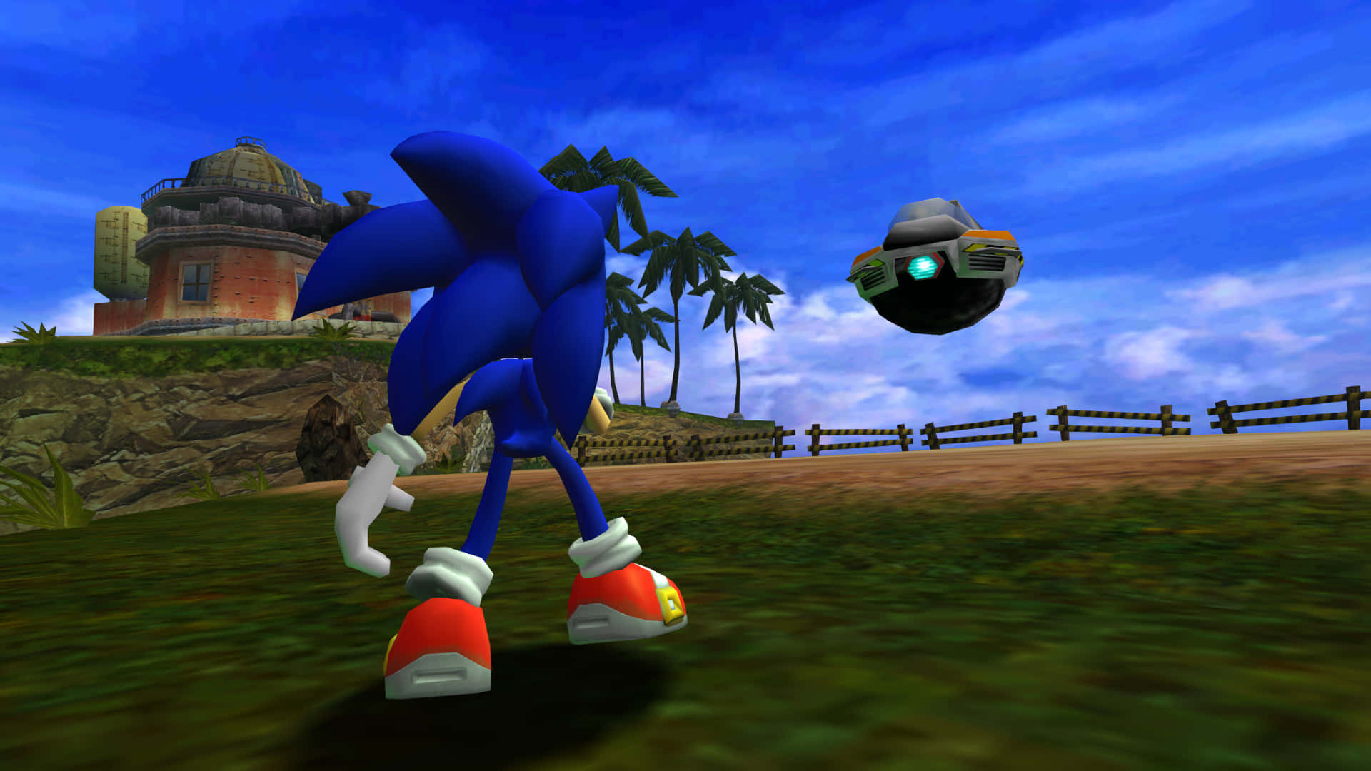 Sonic the Hedgehog 在熱帶遊戲場景中跑向漂浮機械人。