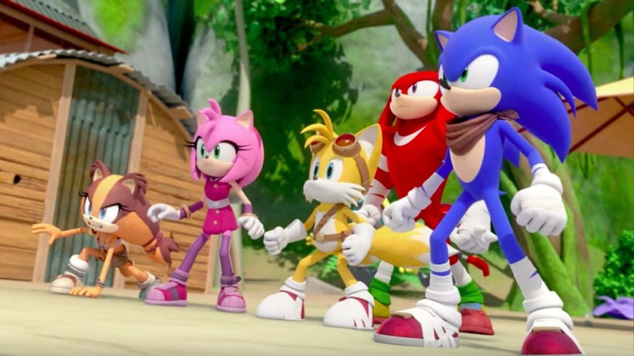 Sonic Dash 桌布 壁紙 — 索尼克和他的朋友們準備好站在木屋附近茂密的森林空地中。