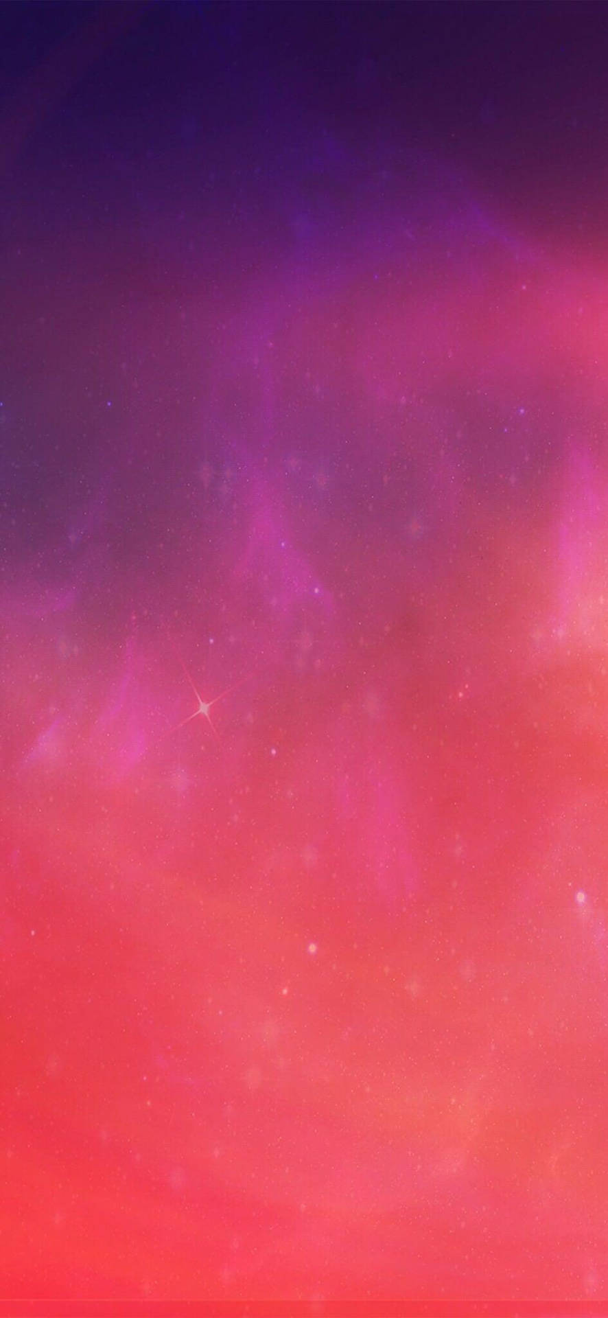 在深空中帶有發光星星的充滿活力的粉紅色、紫色和紅色宇宙星雲。