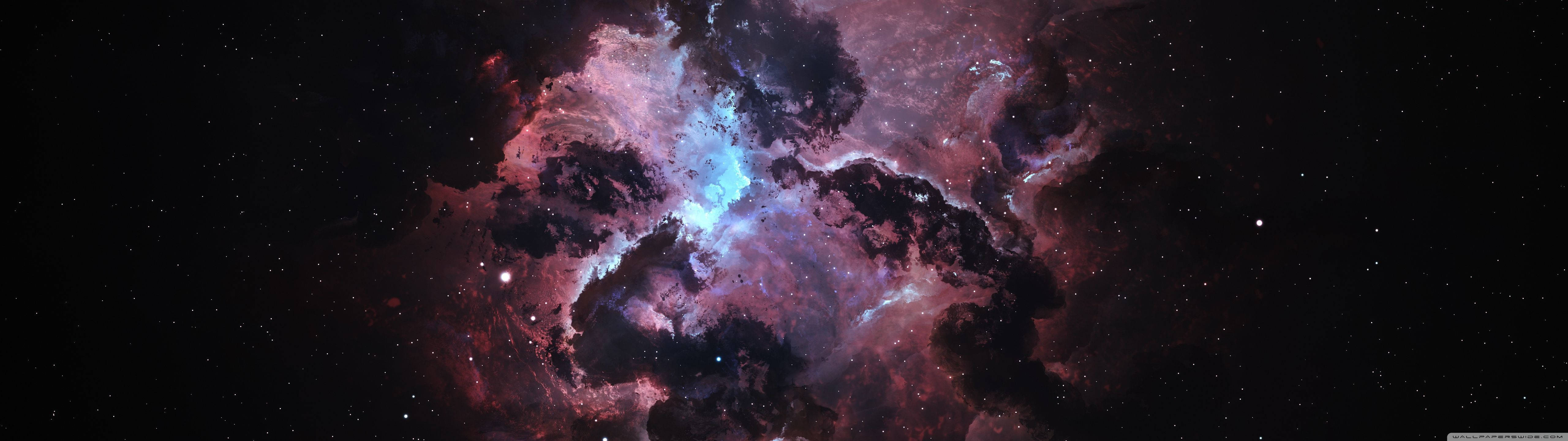 鮮豔的宇宙星雲，在星空背景下發出粉紅色、紫色和藍色光芒。