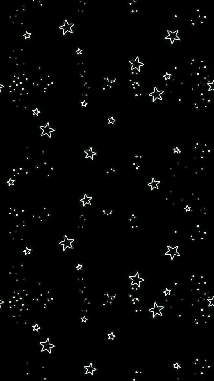 黑色背景搭配白色輪廓星星和點點，營造極簡夜空設計。
