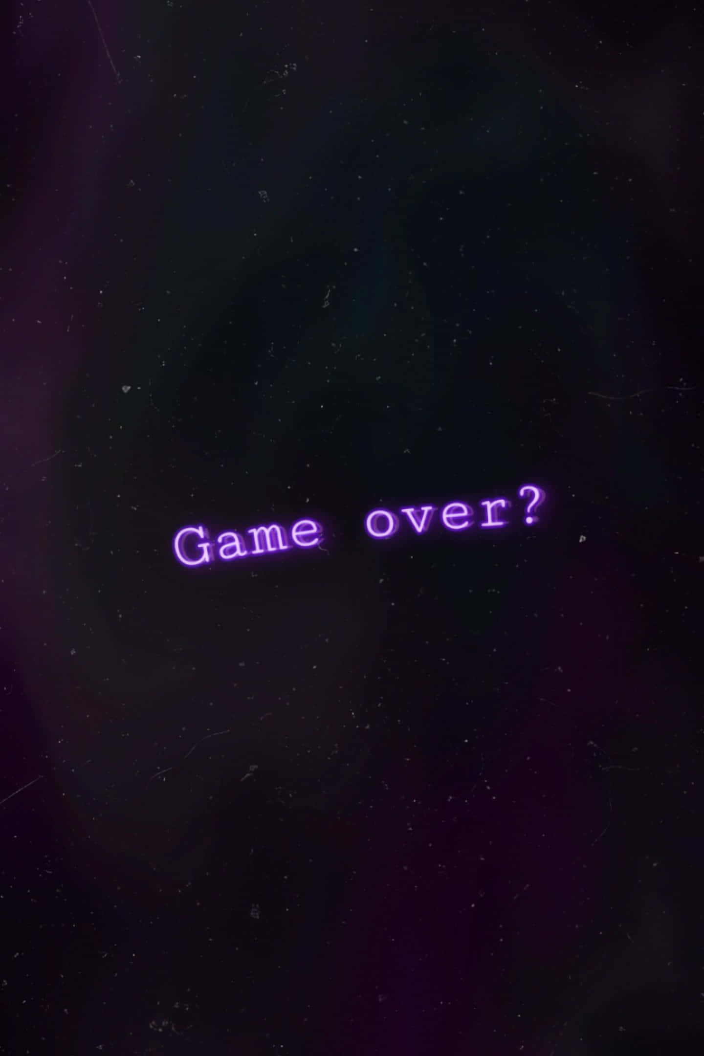 Dark Game Over 桌布 壁紙 — 紫色發光文字顯示「game over?」漂浮在佈滿星星的黑暗宇宙虛空中。