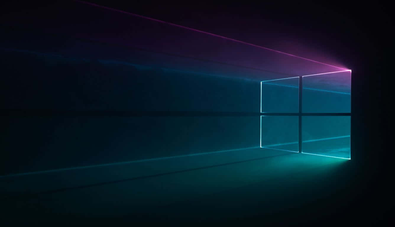 在黑暗房間中帶有霓虹光束的發光Windows標誌。