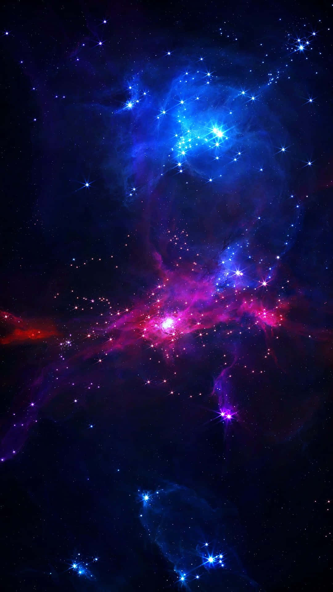 在深空中，充滿活力的宇宙星雲，帶有藍色和粉紅色的雲朵以及閃爍的星星。