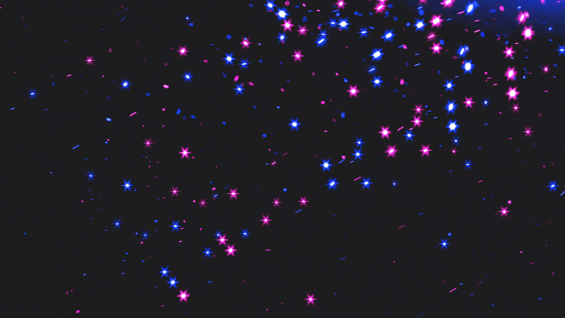 在黑暗宇宙空間中漂浮的霓虹粉紅色和藍色星爆。