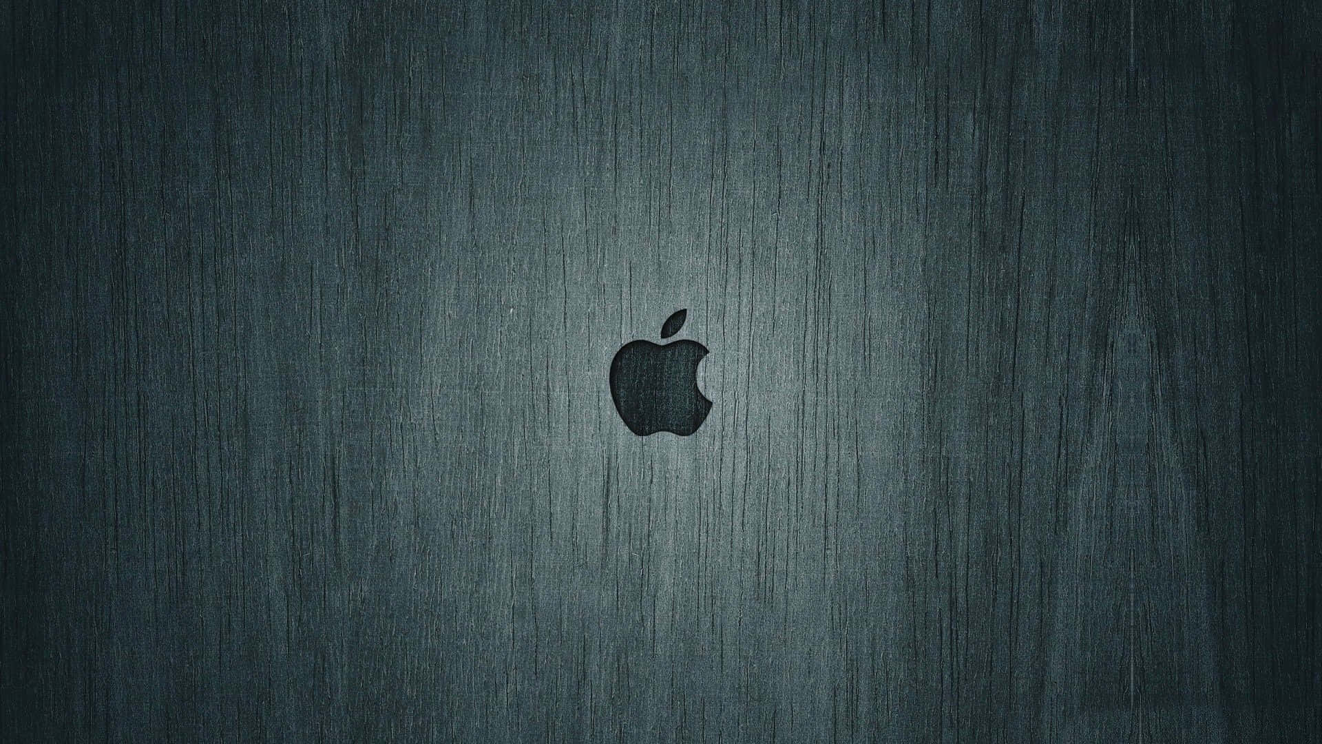 拉絲金屬背景上的Apple標誌