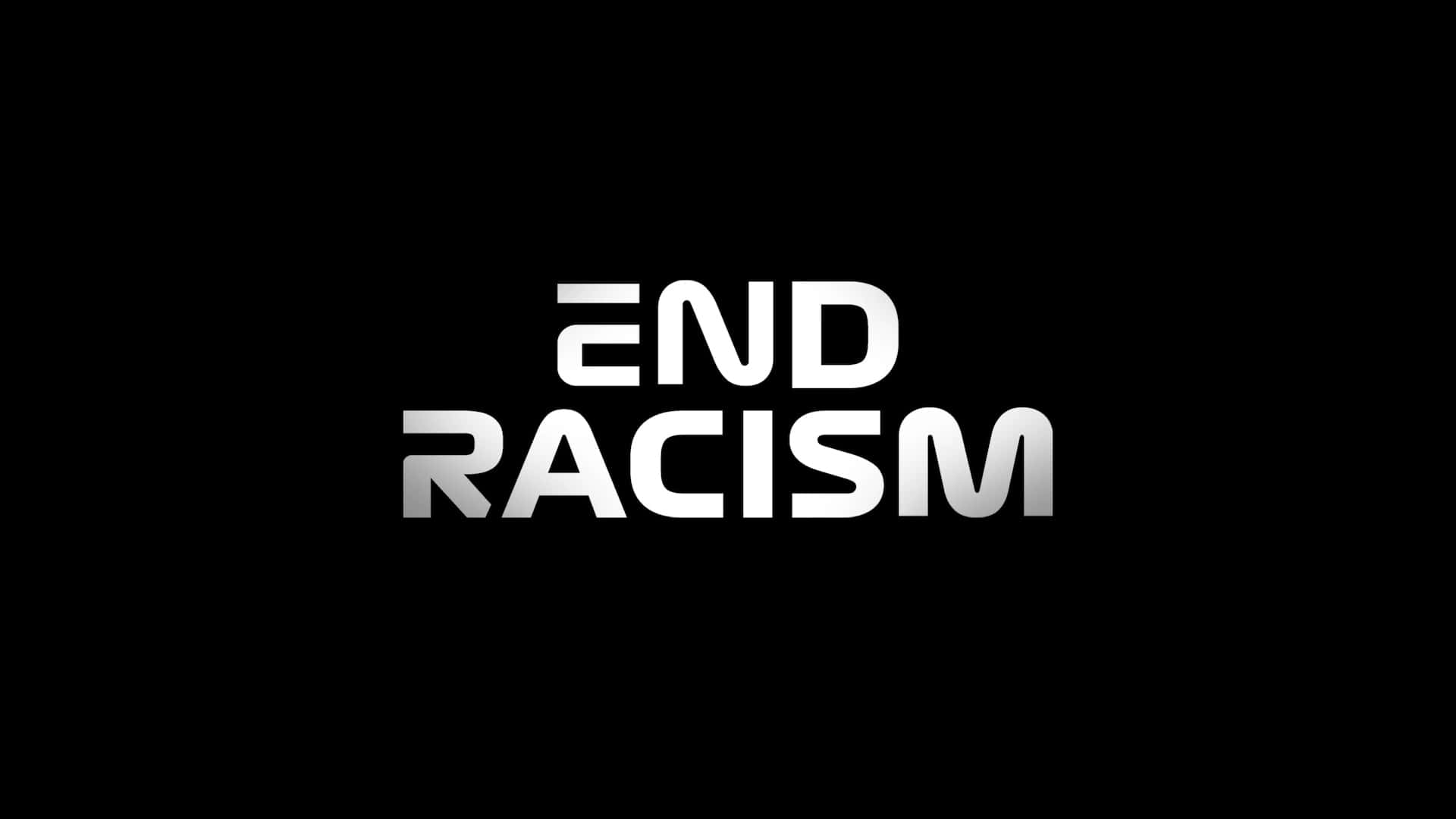 黑色背景上帶有粗體白色文字「END RACISM」。