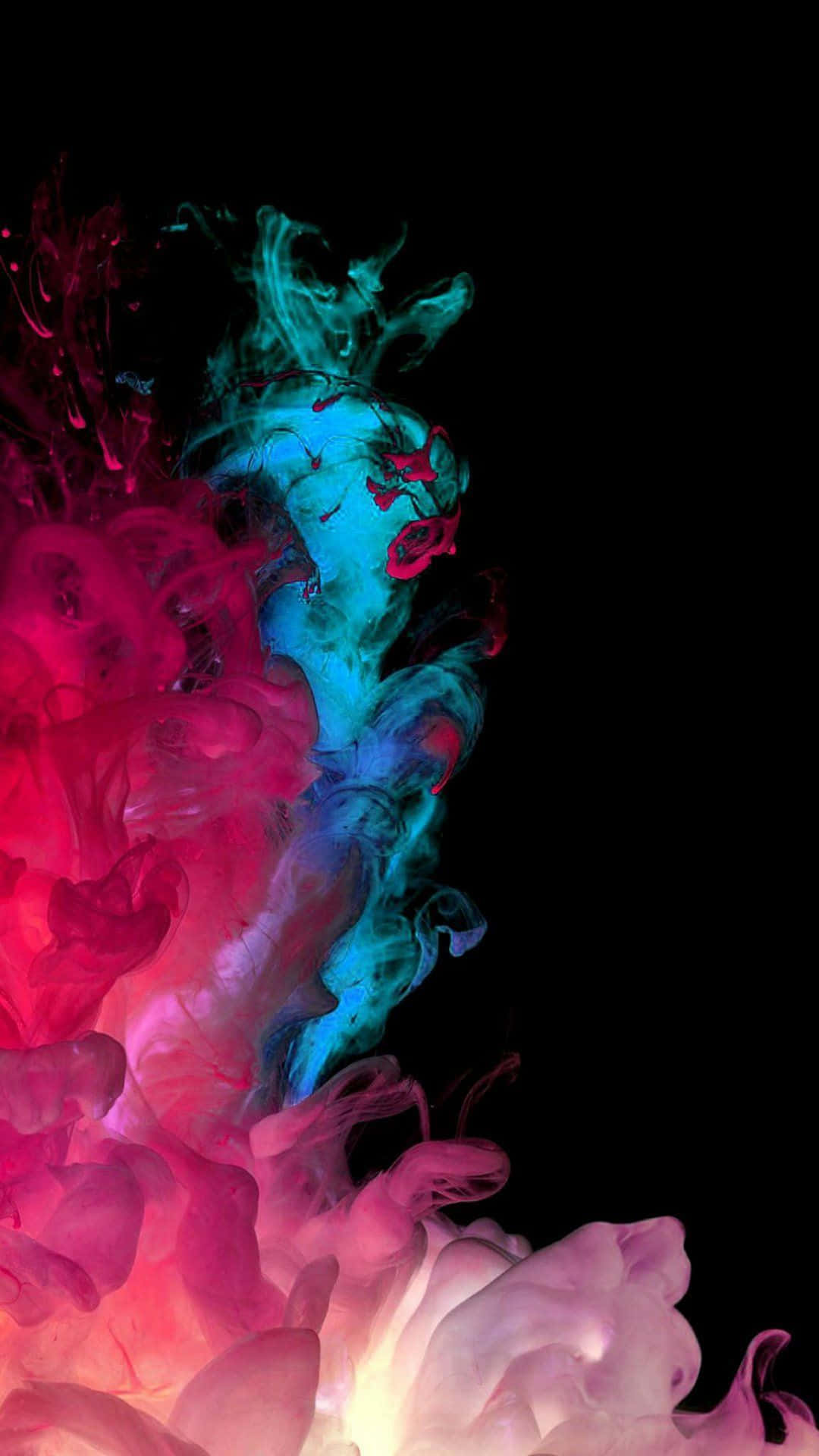 絢麗宇宙 - 震撼的 AMOLED 顯示 壁紙 — 鮮豔的粉紅色和青色墨水漩渦在純黑色背景上爆炸，形成動態的抽象爆發。