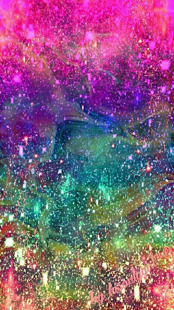 絢麗的彩虹閃粉 壁紙 — 充滿活力的宇宙星雲以電光粉紅、紫色和藍綠色旋轉，畫布上閃爍著星光點點。