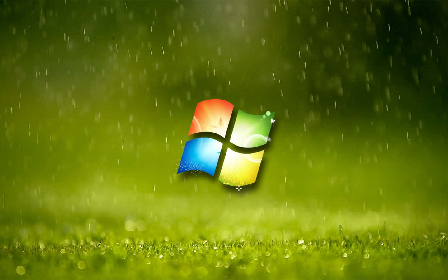 Windows 標誌漂浮在草地上，雨水落下