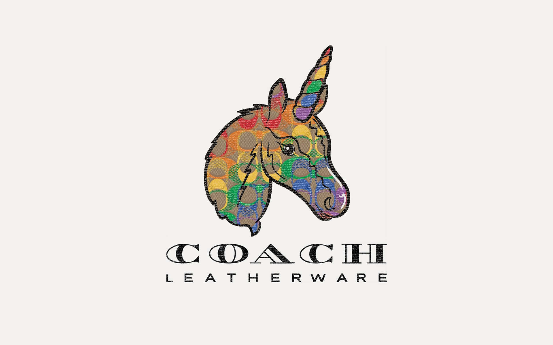 Coach leatherware 標誌，特色是帶有彩虹角的拼布獨角獸頭。