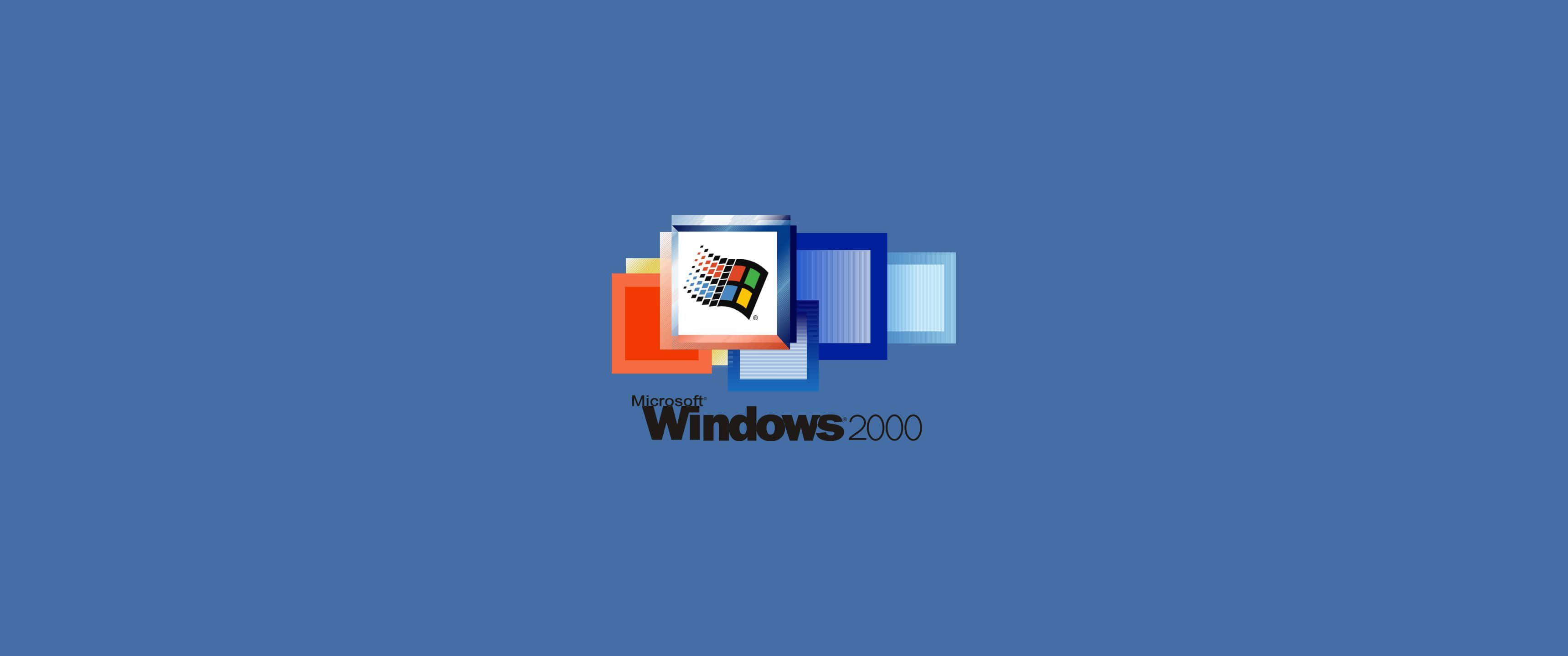 2000s 桌布 壁紙 — 經典Windows 2000標誌居中於純藍色背景上，帶有彩色像素化視窗圖示。