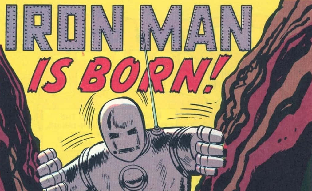 Iron Man Comics 桌布 壁紙 — 經典漫畫書面板顯示鐵甲奇俠從岩石懸崖中出現，並以粗體文字宣告「IRON MAN IS BORN!」