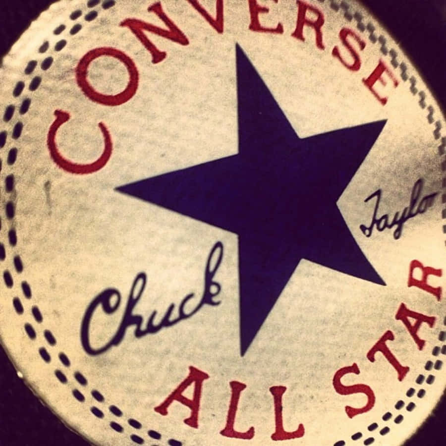 Converse Chuck Taylor All Star 標誌布章，紅色文字和藍色星星。