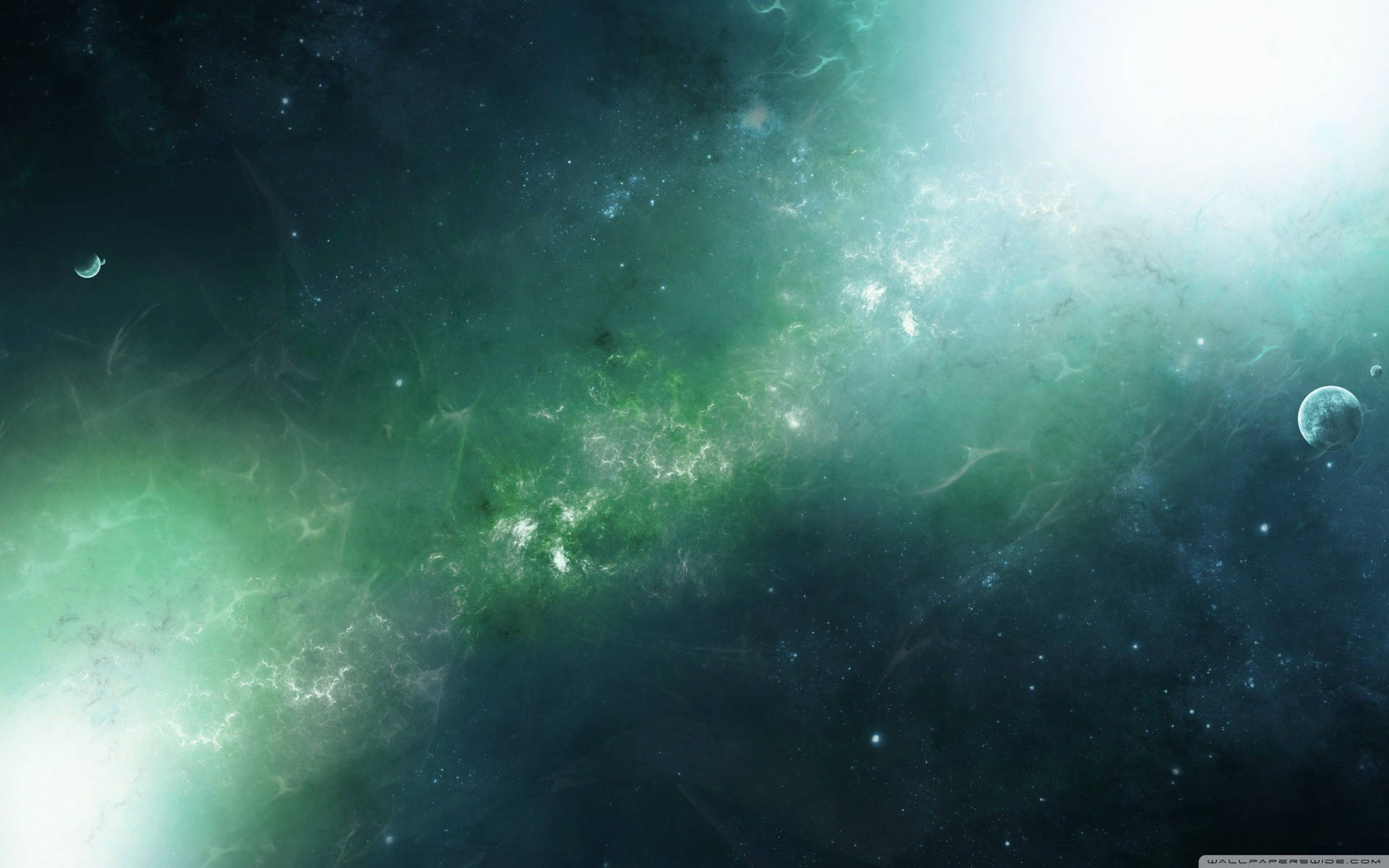 深空中帶有發光星星和遙遠行星的鮮豔綠色和藍綠色星雲。 — 綠色天空 壁紙