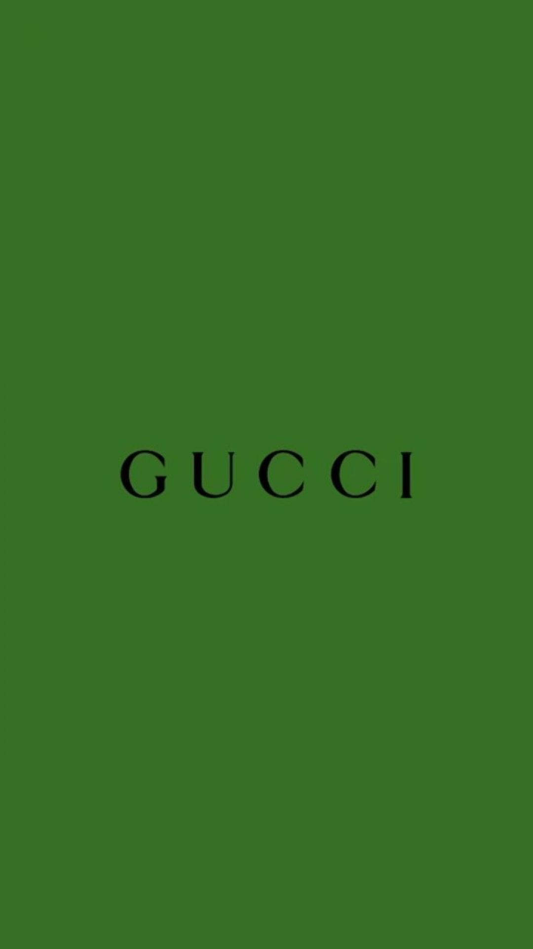 綠色背景上的黑色Gucci標誌