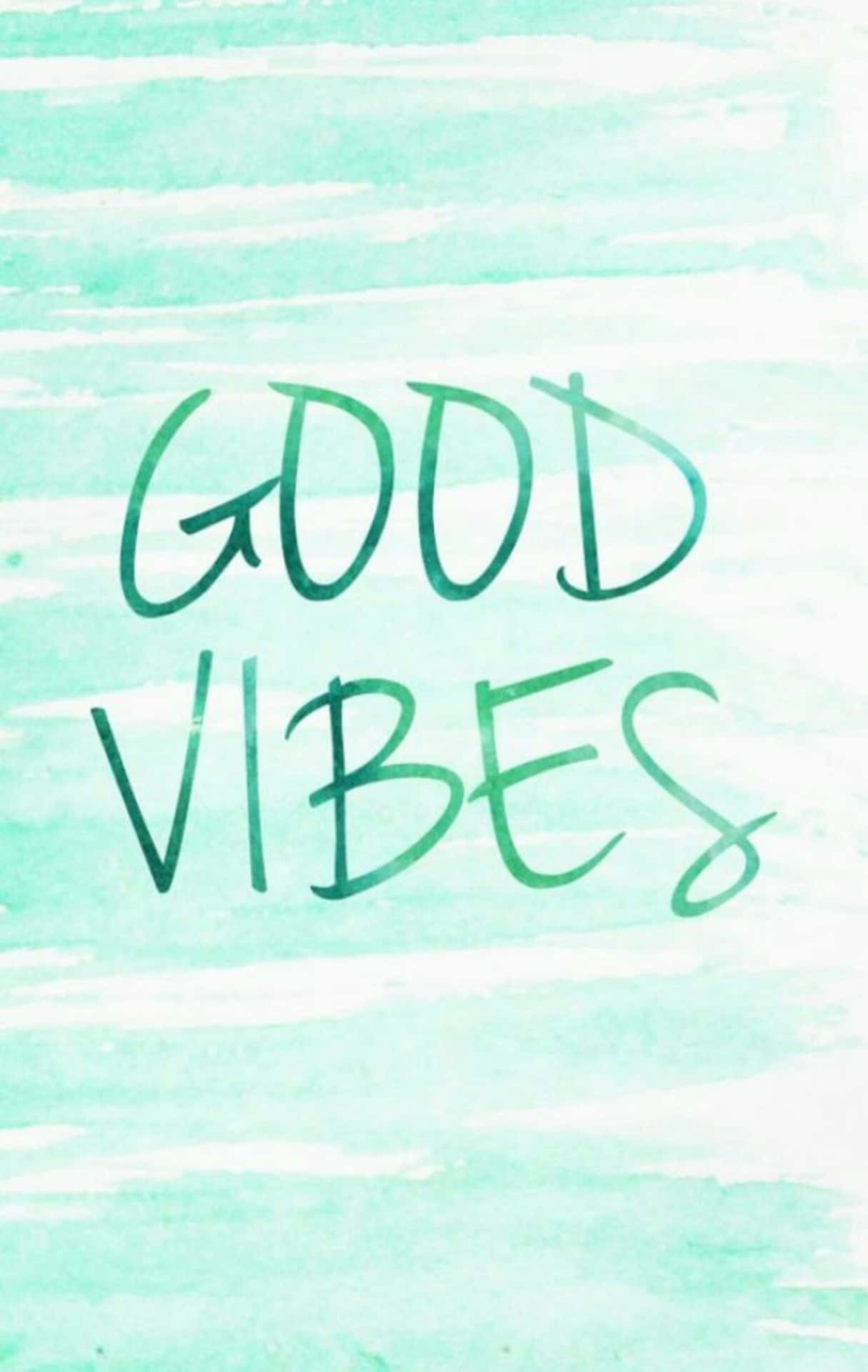 在薄荷水彩背景上以綠色手寫的Good vibes