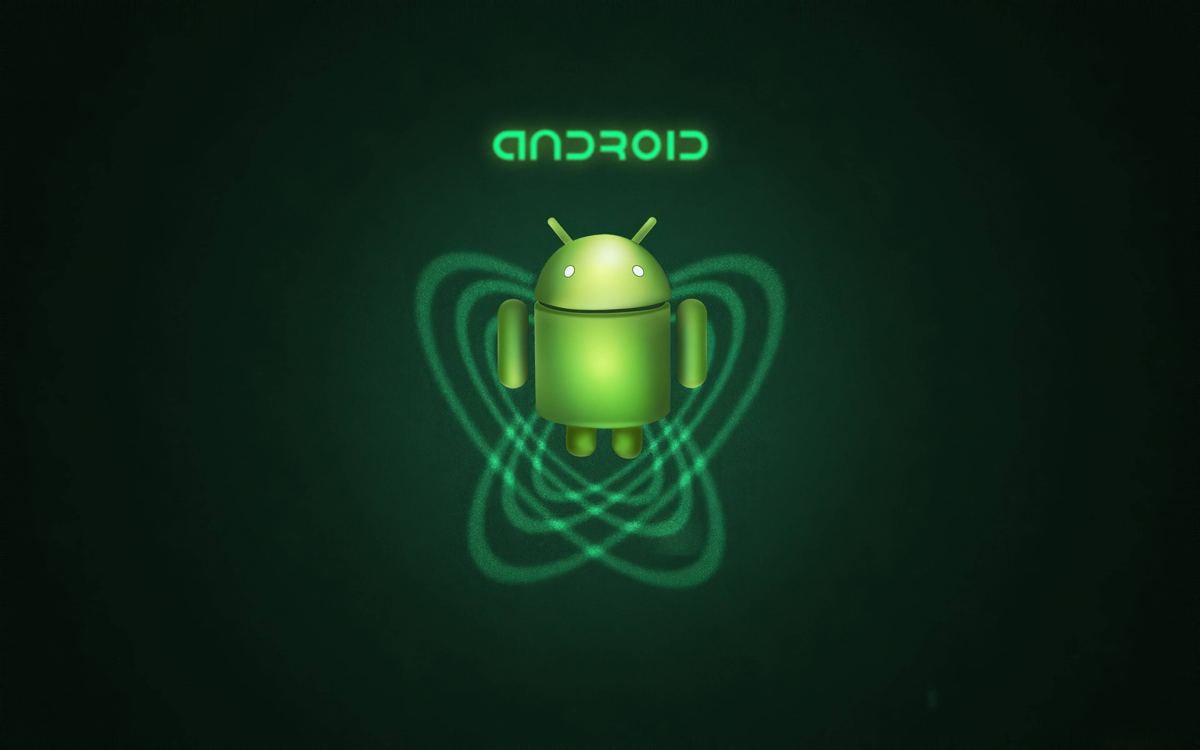 綠色安卓螺旋桌面壁紙 壁紙 — 一個發光的綠色Android機械人圖示漂浮在深色背景上，帶有旋轉的能量線條和上方反轉的文字。