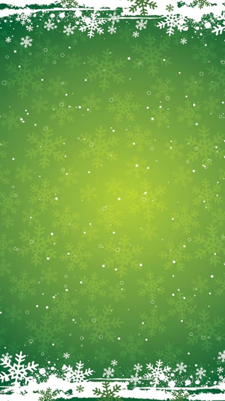 帶有雪花和裝飾邊框的綠色節日牆紙。