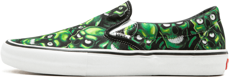 綠色骷髏圖案 Vans 滑動鞋 壁紙 — 一雙Vans slip-on運動鞋，黑色布料上有鮮綠色骷髏圖案，白色橡膠鞋底。