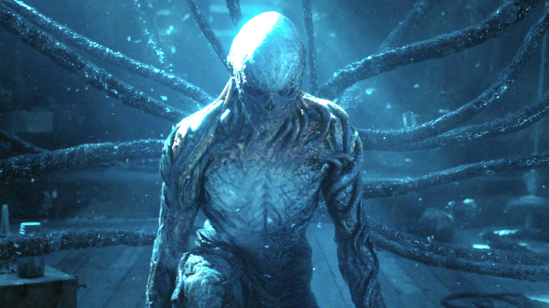 水下工業場景中頭部發光並帶有觸手的外星生物