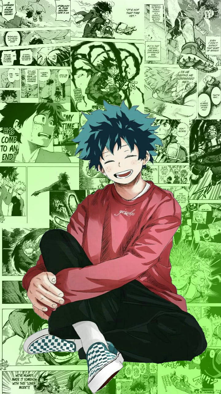 緑谷出久可愛漫畫格 壁紙 — 一個開心的藍髮動漫男孩盤腿坐在綠色漫畫面板拼貼畫前。