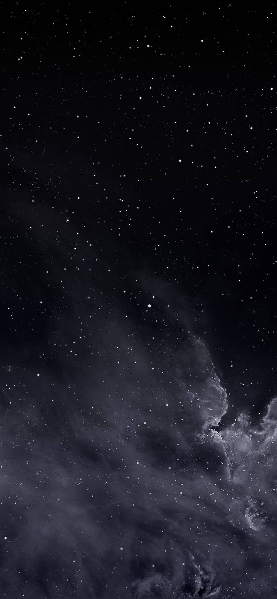 繁星點點的夜空，黑暗星雲在太空中飄移。