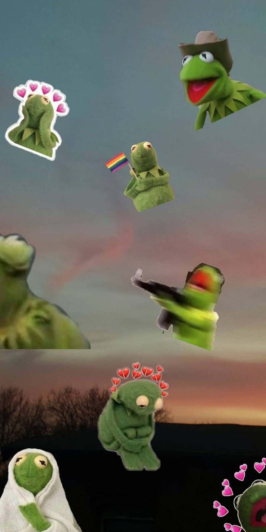繽紛美學青蛙壁紙 壁紙 — 漂浮的Kermit the Frog毛絨玩具，帶有心形和彩虹旗，背景是暮色天空和光禿禿的樹木。