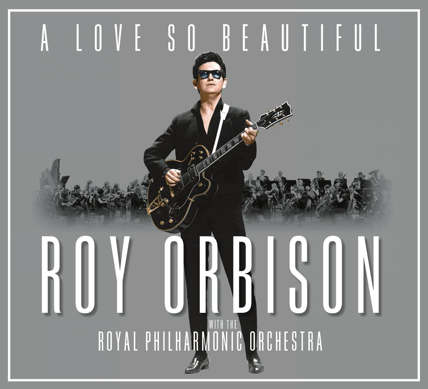 Roy Orbison 在專輯封面上拿著結他，身後有樂團。