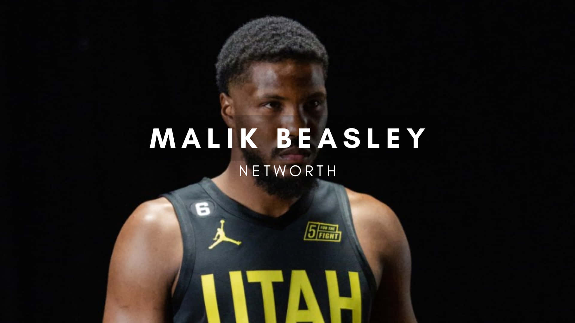 籃球運動員 Malik Beasley 身穿猶他州球衣，帶有文字疊加。