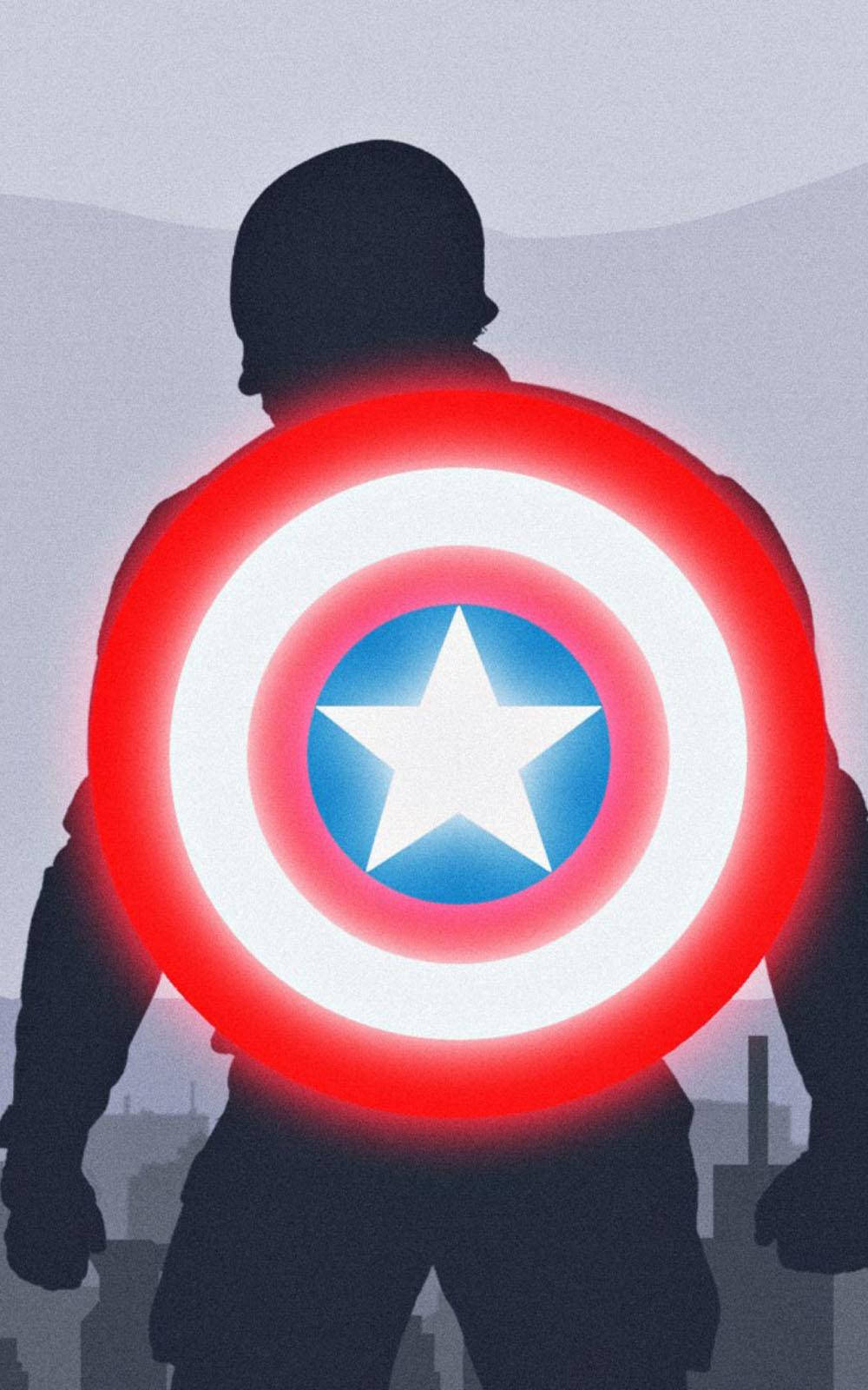 Marvel Aesthetic 桌布 壁紙 — 美國隊長在黃昏的城市天際線前舉起發光盾牌的剪影。