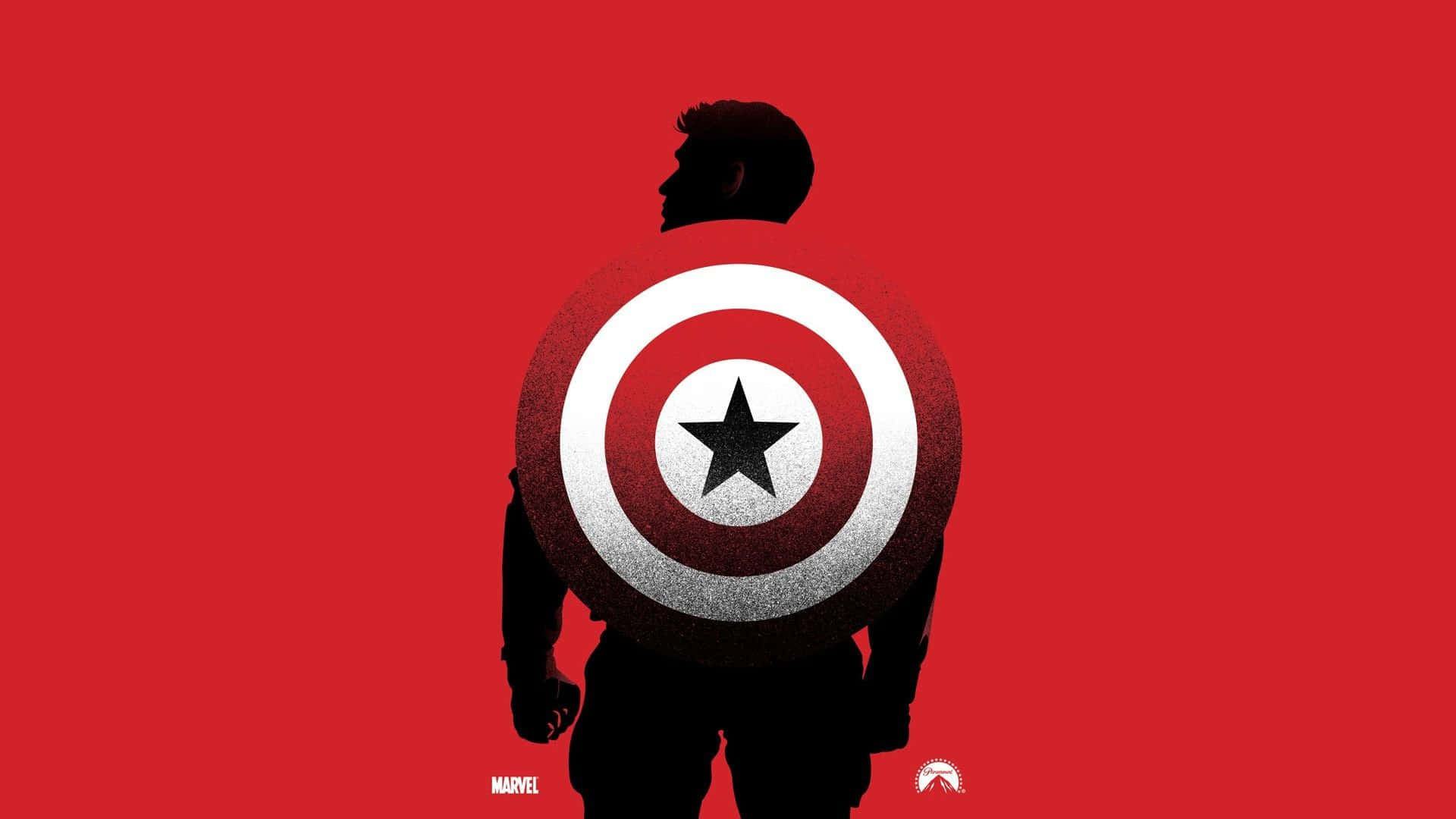 Best Captain America 桌布 壁紙 — 美國隊長的剪影，手持其標誌性盾牌，背景為大膽的紅色。