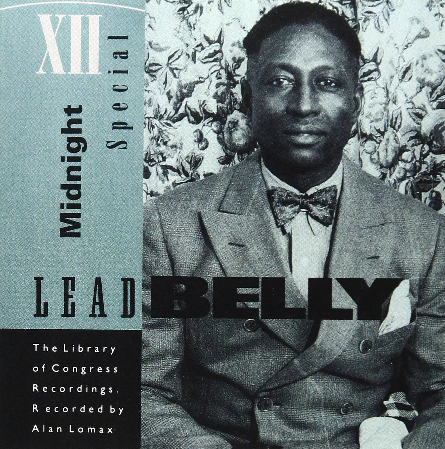 Lead Belly 穿著西裝和領結，來自美國國會圖書館錄音的復古照片。
