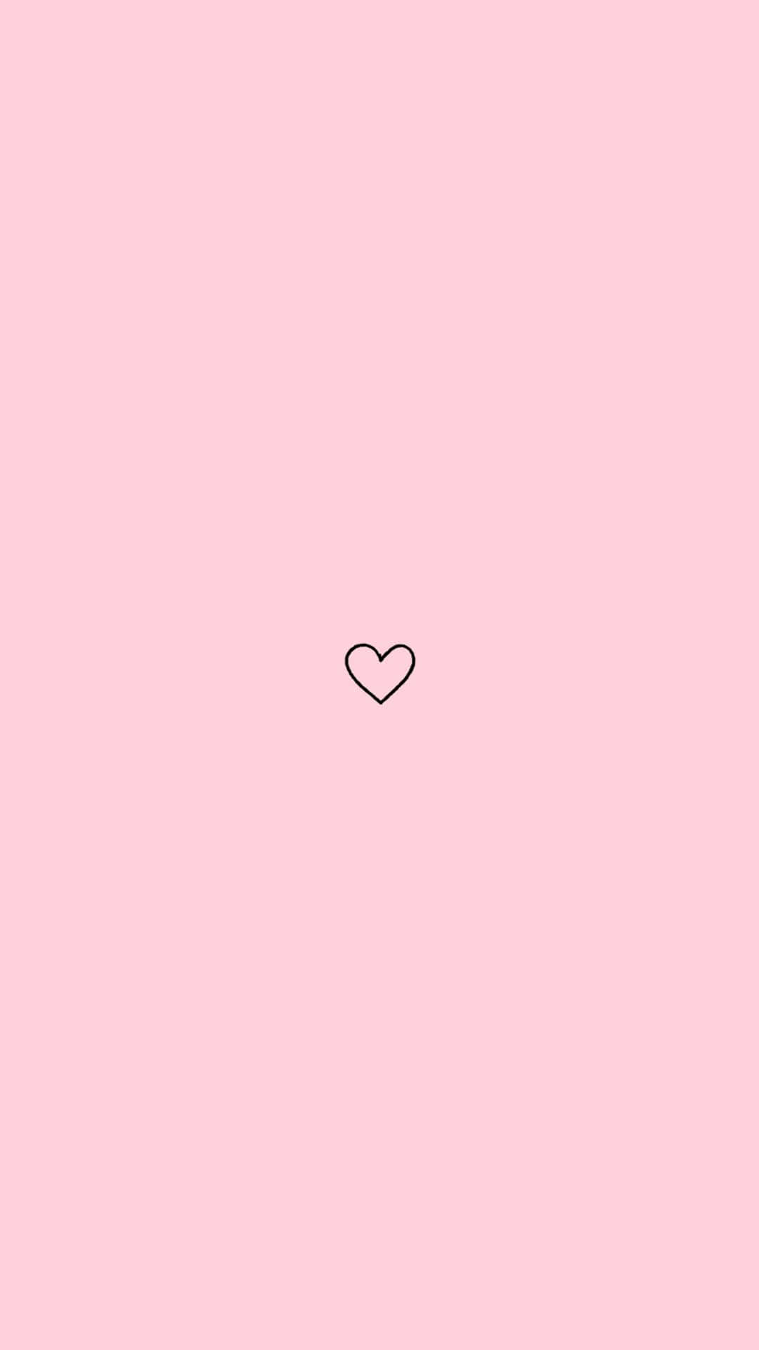 美學 Instagram 最簡約心形 壁紙 — 一個極簡黑色輪廓心形，居中於柔和的粉紅色背景上。