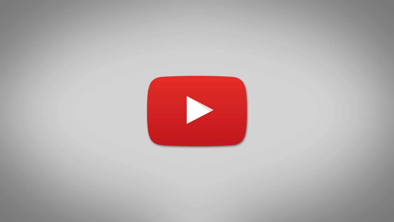 灰色漸變背景上的 YouTube 播放按鈕標誌
