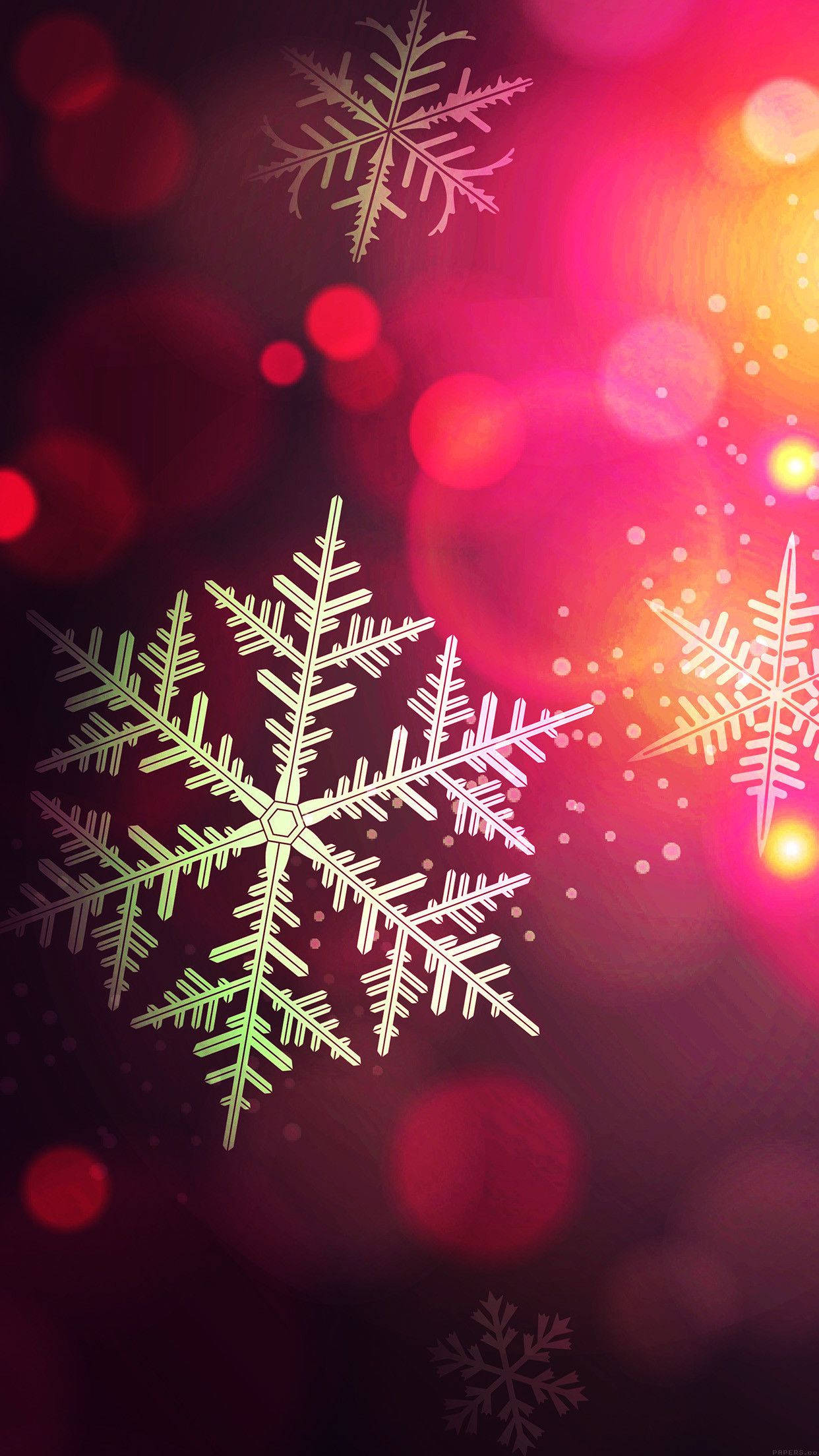 美學聖誕背景藝術 壁紙 — 發光的雪花在紅色和粉紅色的鮮豔散景背景上漂浮，並帶有發光球體。