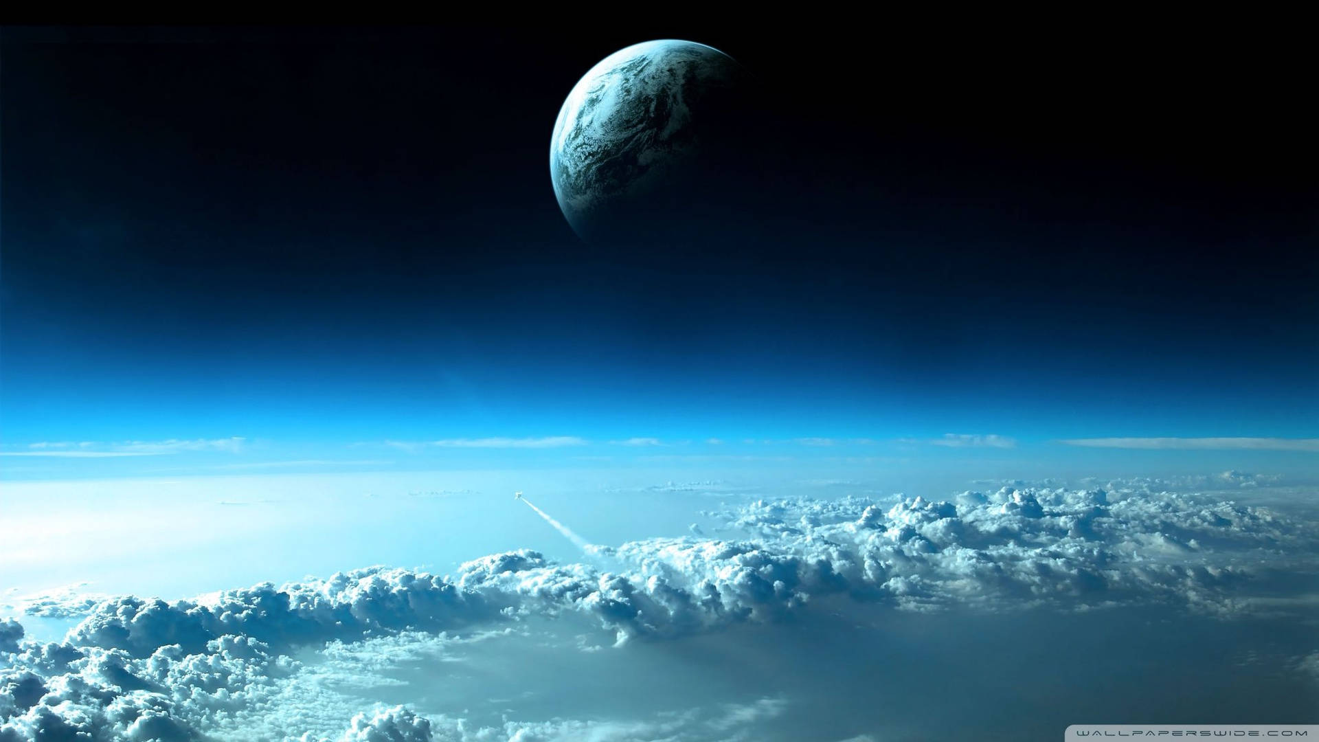 火箭穿過雲層升向太空中的地球